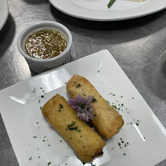 Hand-rolled spring rolls with dipping sauce
